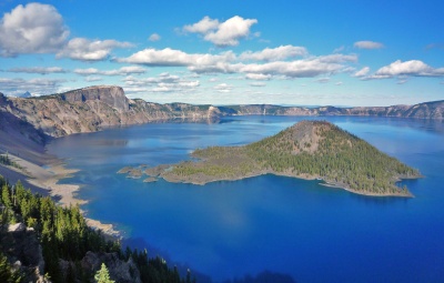 What lake is 1,949 feet deep but is only fed by rainwater and snowmelt?
